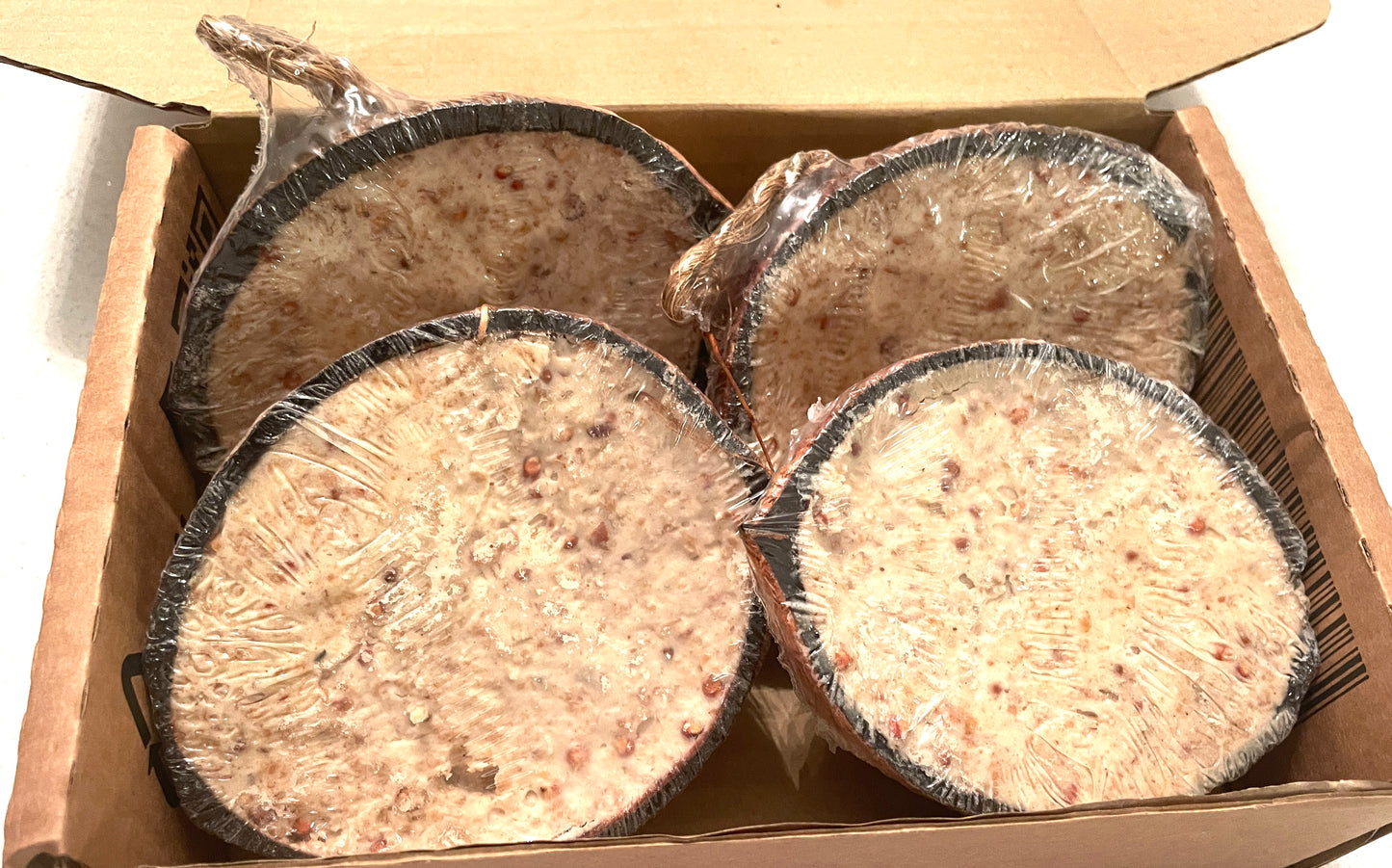 Suet-Filled Half Coconuts for Wild Bird feeding - Honest2Nature